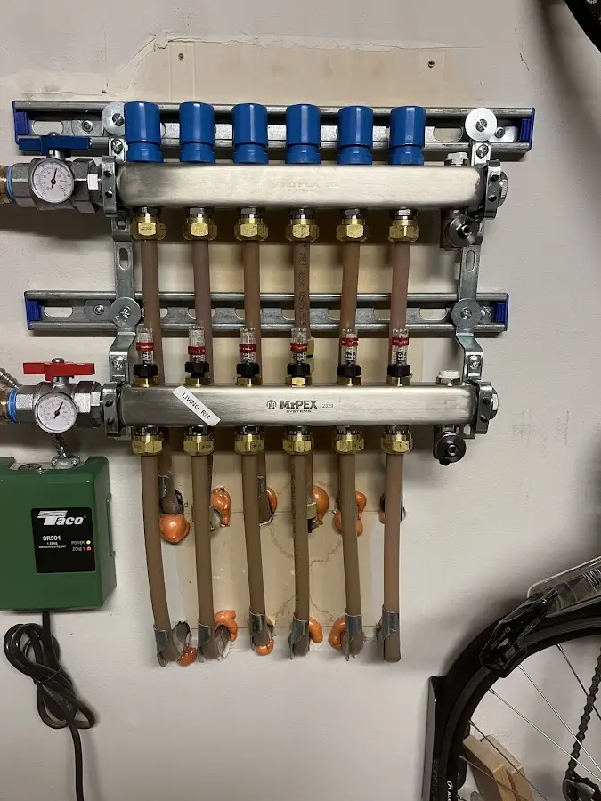 Plumber performing Gas Line Installation at a residential property in Hartford